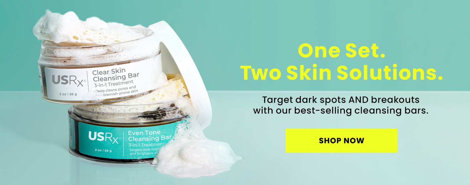 Two USRx cleansing bars open with suds coming out against a light blue background with text overlay