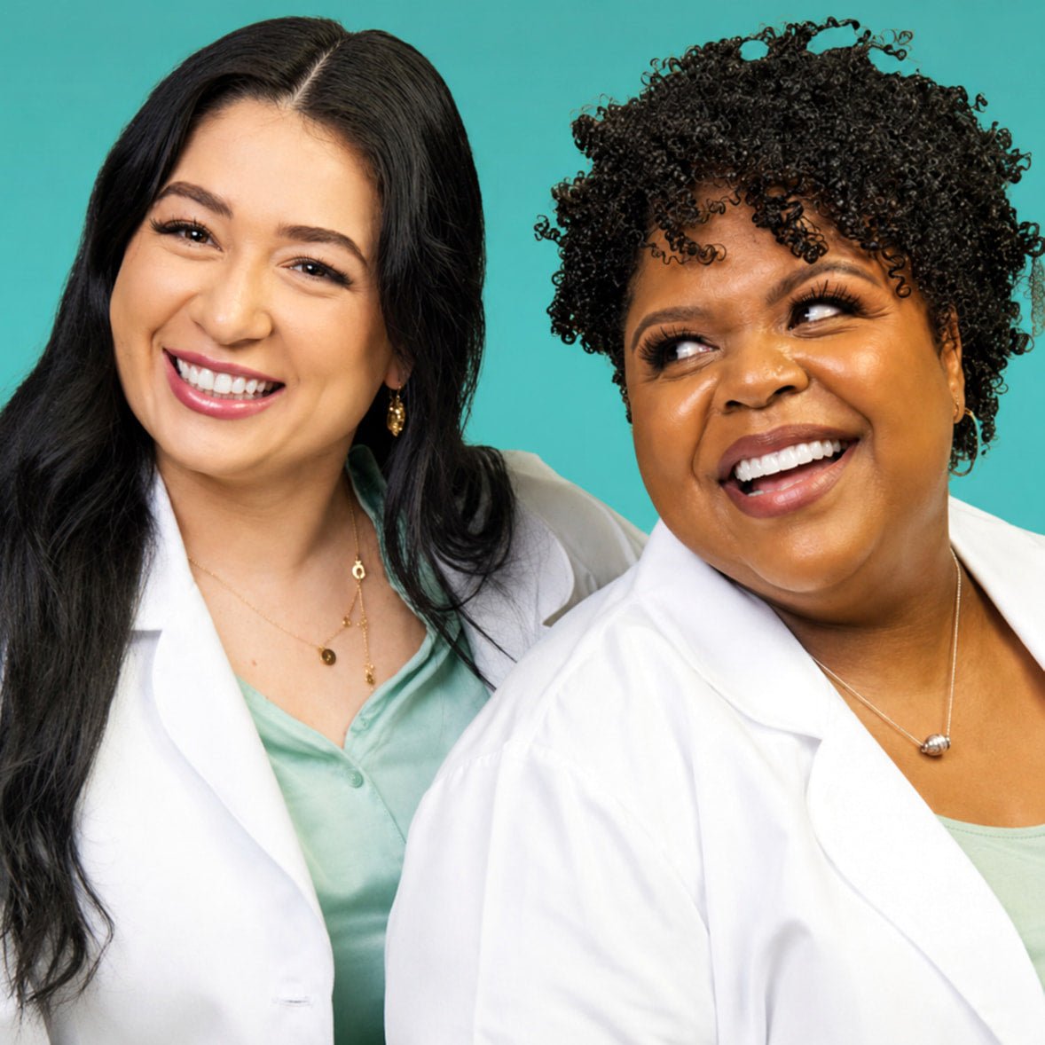 Two USRx licensed estheticians in white lab coats against a light blue background